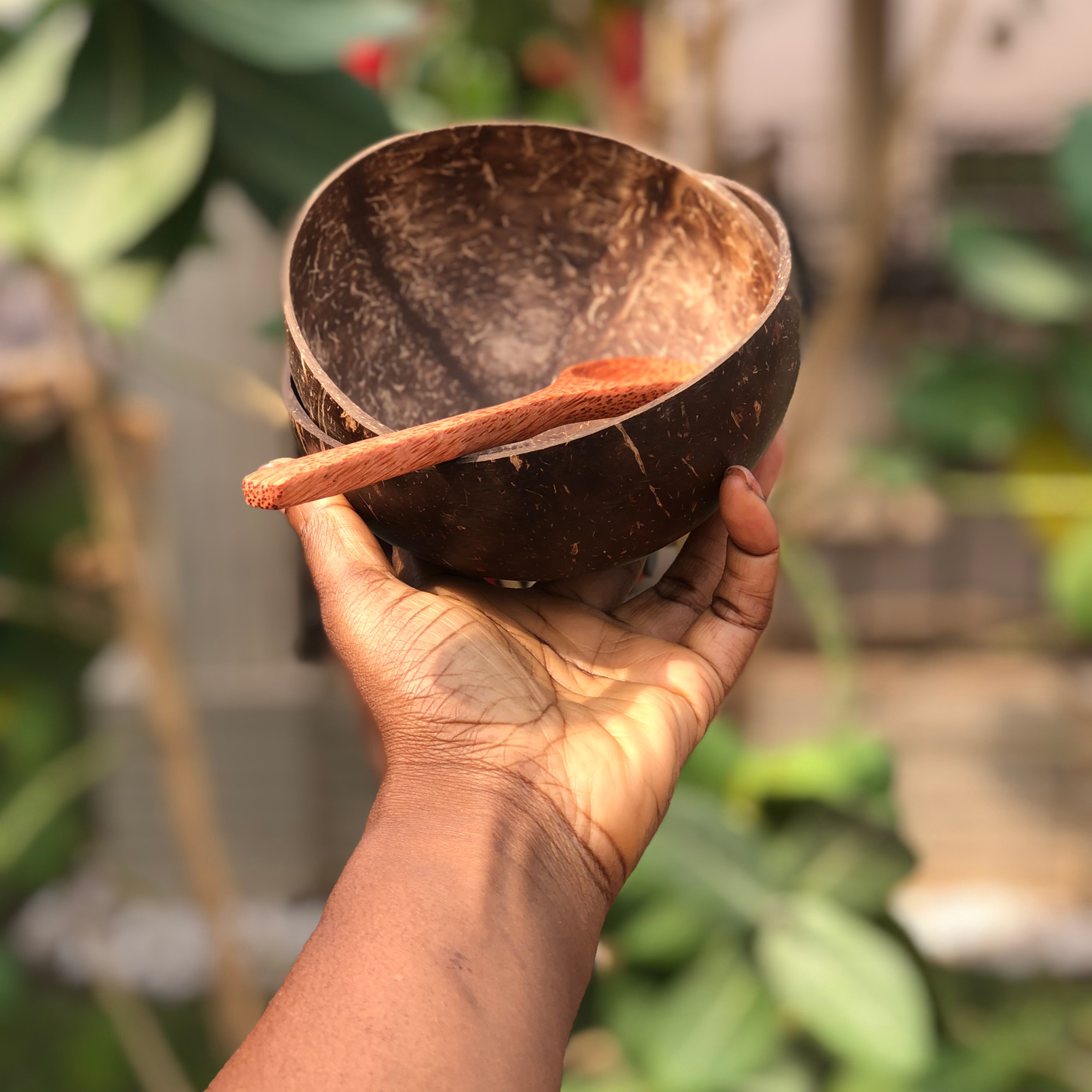 Natural Mixing bowl with wooden spoon | Coconut Shell Nzema Appolo